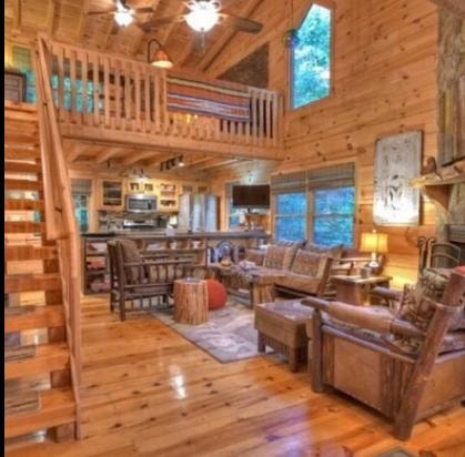 Cozy log cabin interior with warm natural lighting and custom furnishings