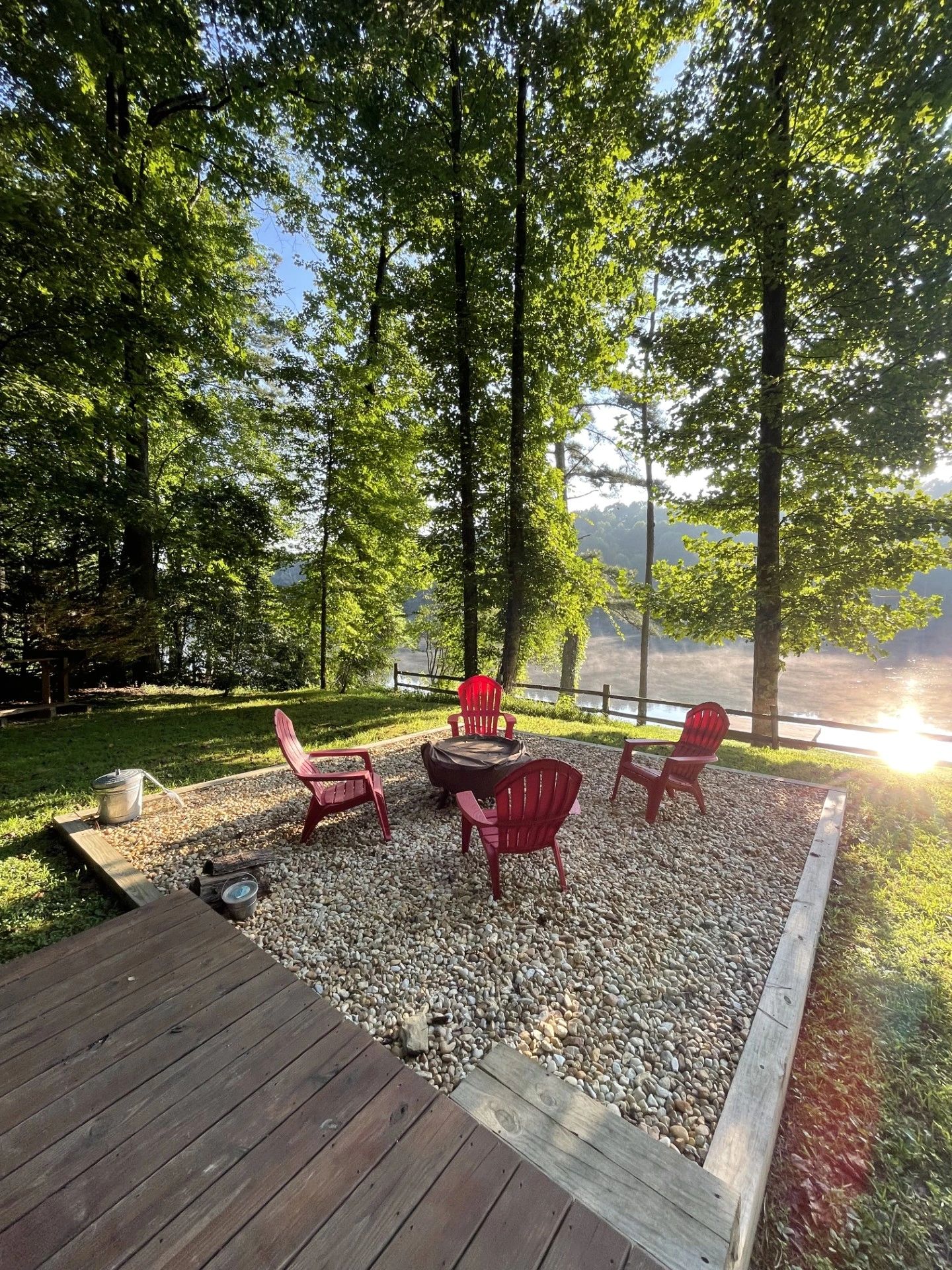 Lakeside fire pit at dusk