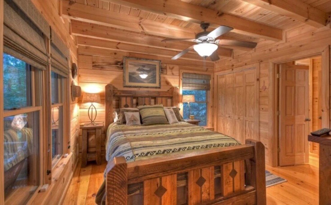 Queen bedroom with natural light